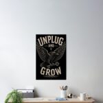 Mockup of Unplug and Grow poster with raven and key over desk for SoTheWay blog.