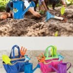Children's 6-piece garden tool kit with watering can, metal trowel, rake, gloves, and tote bag on rich garden soil